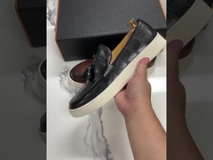 Zapatos de los hombres