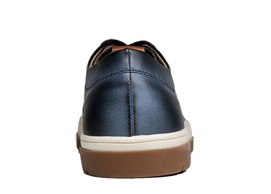 Mujeres de pie redondo de cuero zapatillas de deporte de moda zapatillas de patineta para hombres
