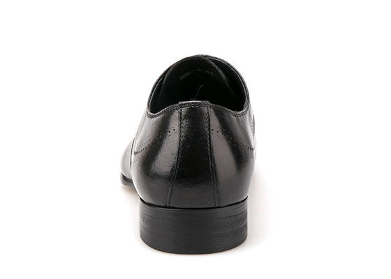 Zapatos de vestir de cuero impermeables de estilo británico para hombres Zapatos de brogue negro