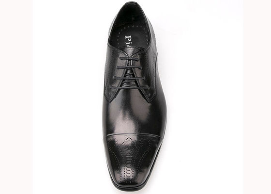 Zapatos de vestir de cuero impermeables de estilo británico para hombres Zapatos de brogue negro