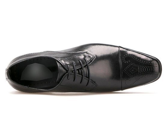Zapatos de vestir de cuero impermeables de estilo británico para hombres Zapatos de brogue negro