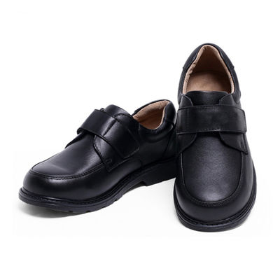 Zapatos escolares unisex de cuero negro tamaño 26-45 Talón plano con forro de cuero