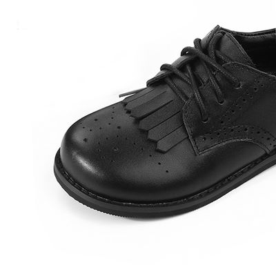 Zapatos escolares de cuero unisex de cordones de tamaño 26-40 Niñas Zapatos de cuero Tassel