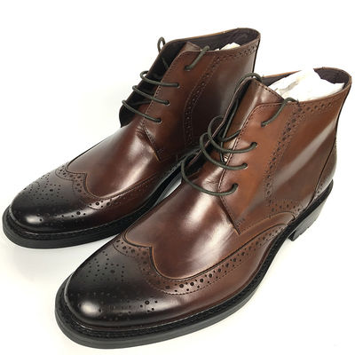 Botas de cuero para hombres de medio invierno marrón, zapatillas de nieve de piel favorable.