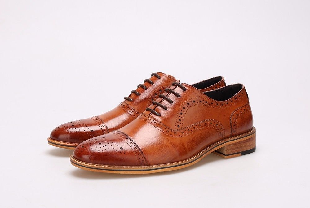 Calzado hecho a mano de estilo británico para hombres calzado de vestir de cuero genuino calzado formal de Oxford Brogues
